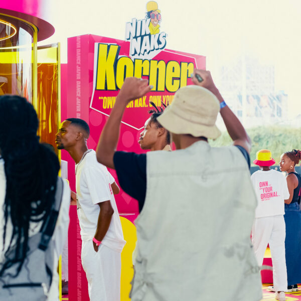 Consumers engaging with a product demonstration and sampling activation at a brand event