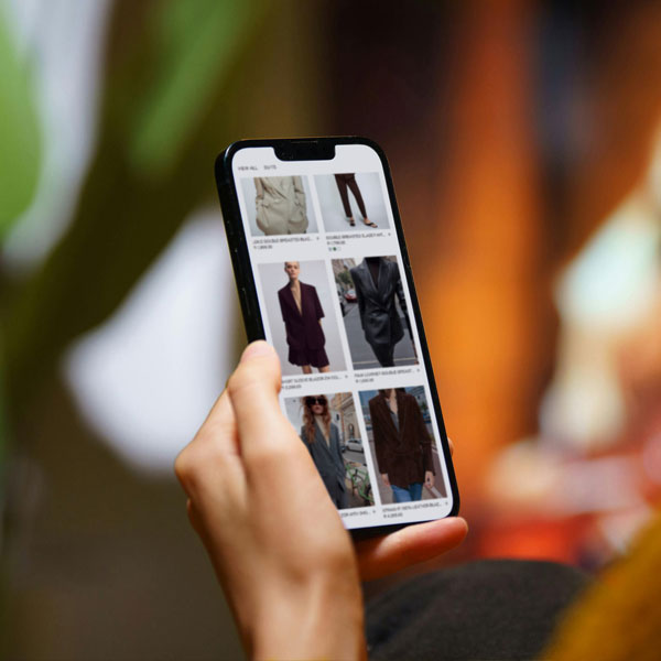 Shopper browsing products on a brand’s ecommerce website on a smartphone