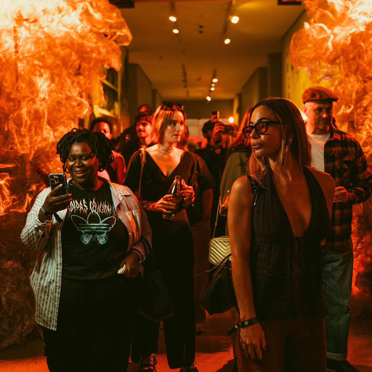 Consumers capturing content and engaging on social media during a live brand activation event