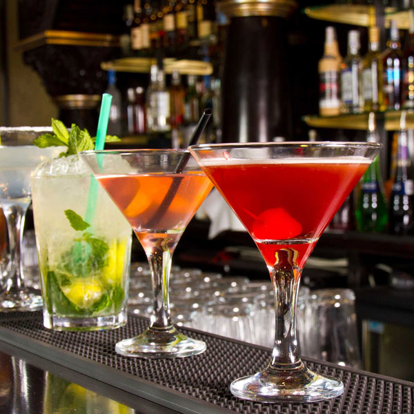 Cocktails served at a bar counter in a hospitality and on-trade environment