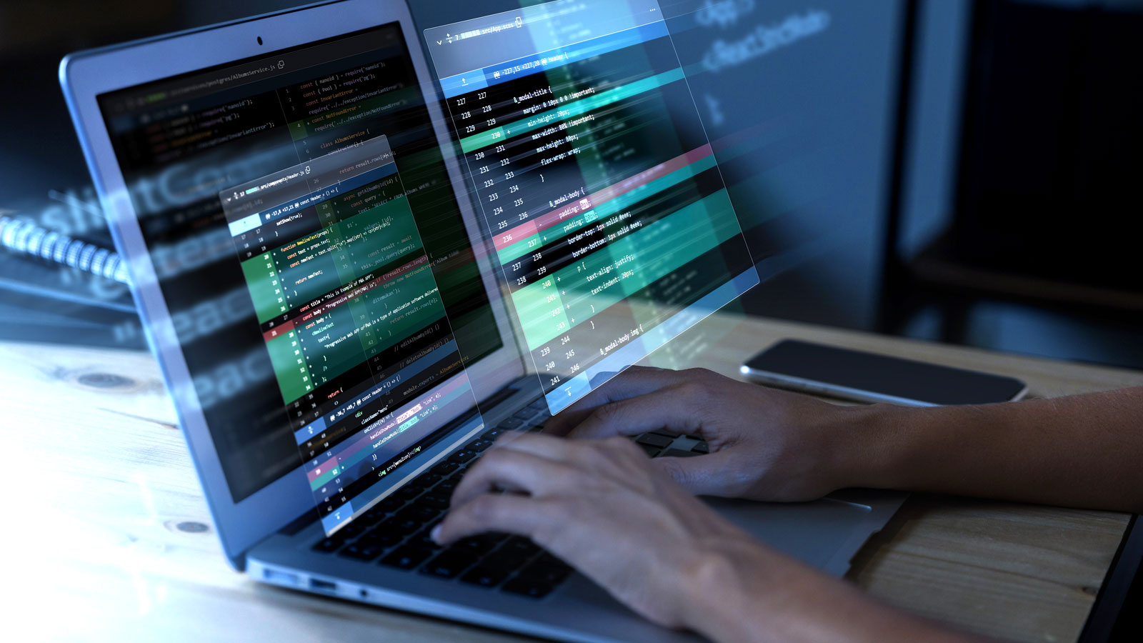 Person analysing retail operations data on a laptop