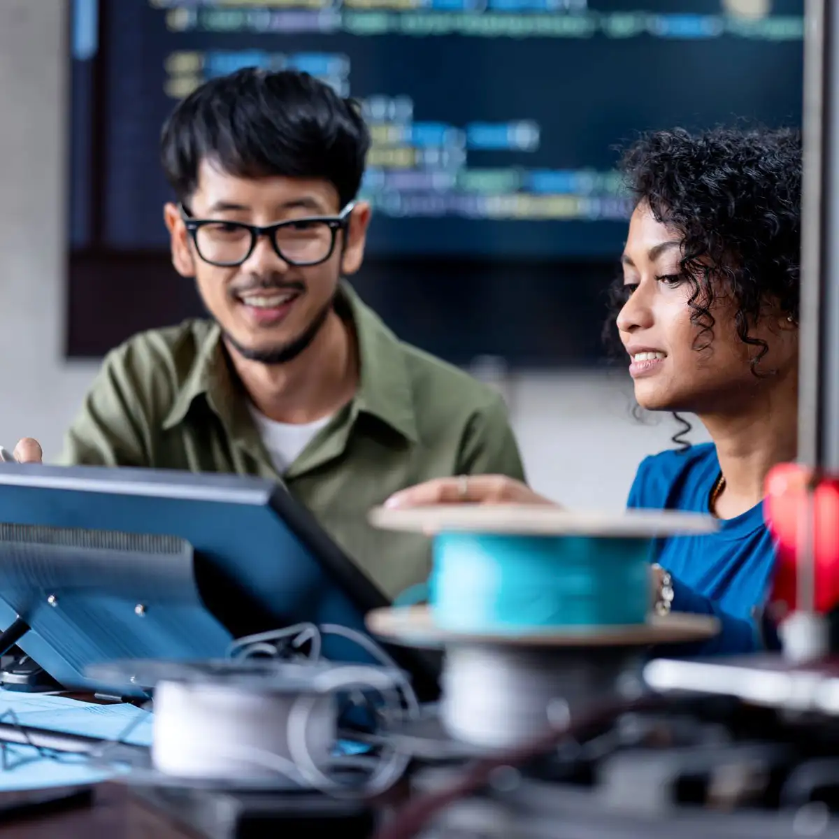 Retail data analysts using digital tools and dashboards to analyse retail performance and insights