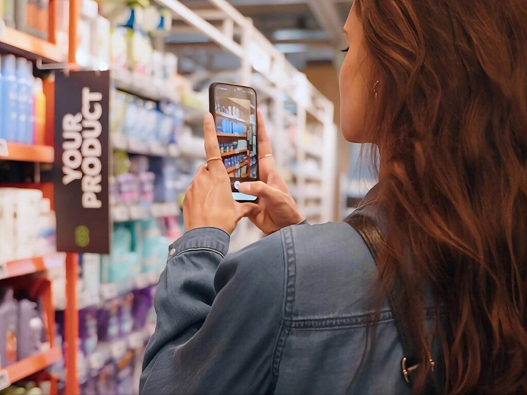 Lady taking a picture of a product shelf
